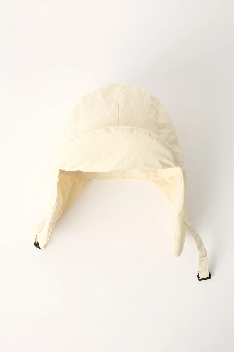 Token Quilted Trapper Hat Cream