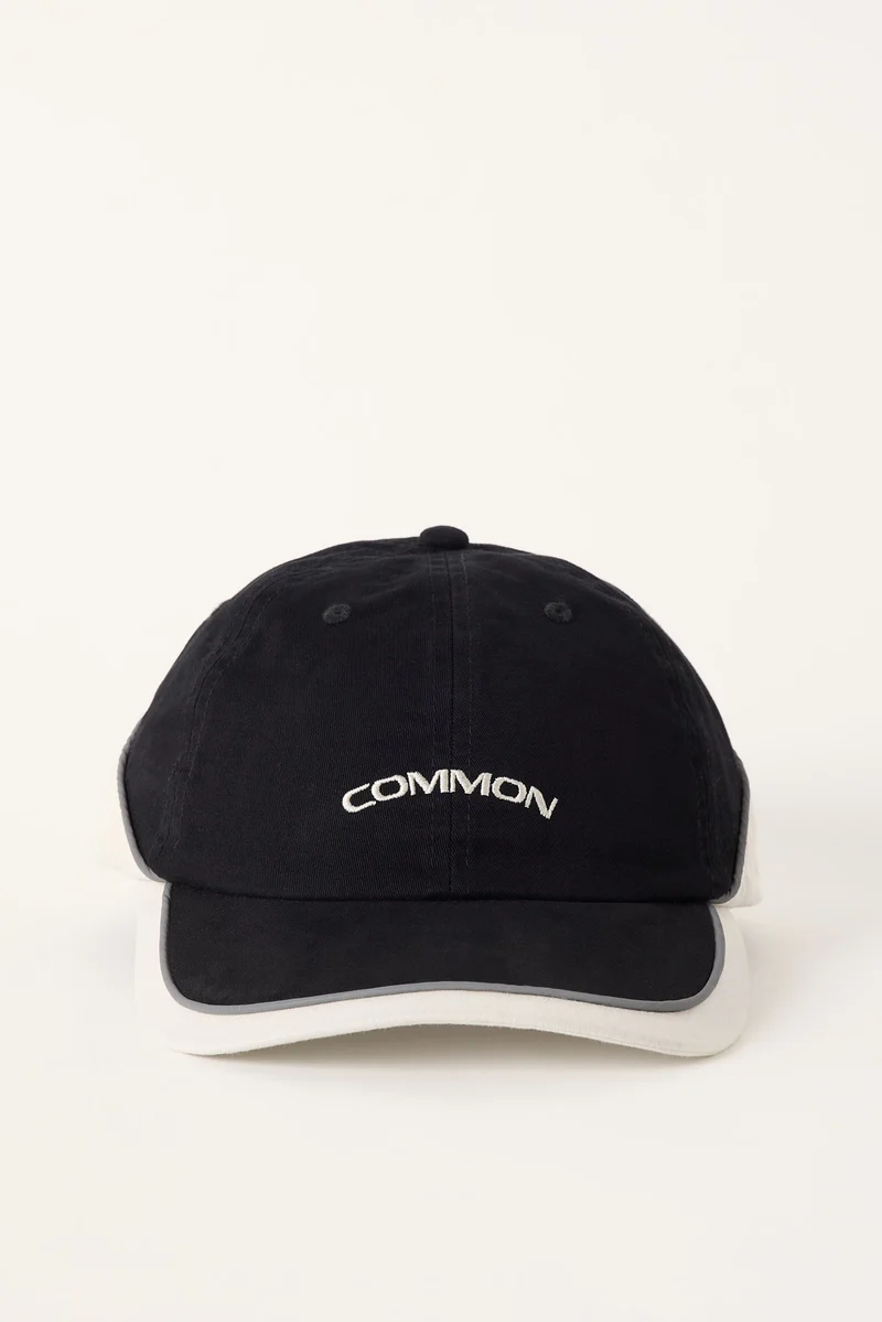 Common Need Stride Panel Cap Off Black/Off White